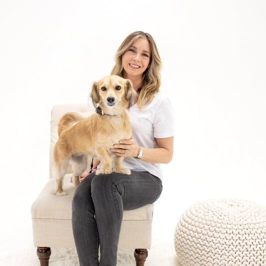 Blondie, the dog, sitting on Melendy Nebbs lap