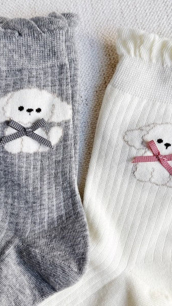 Bichon_Puppy_Design_Socks. Set of 2: one in gray and one in ivory.