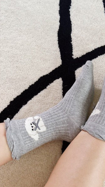 Bichon_Puppy_Design_Socks. Set of 2: one in gray and one in ivory.