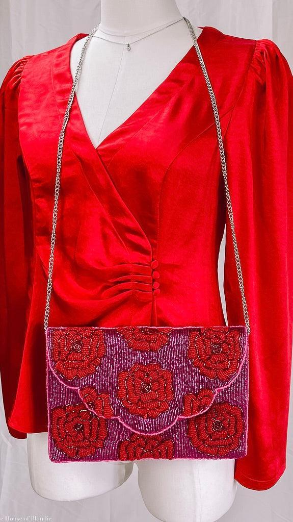 Red Roses On Pink Beaded Clutch by www.thehouseofblondie.com