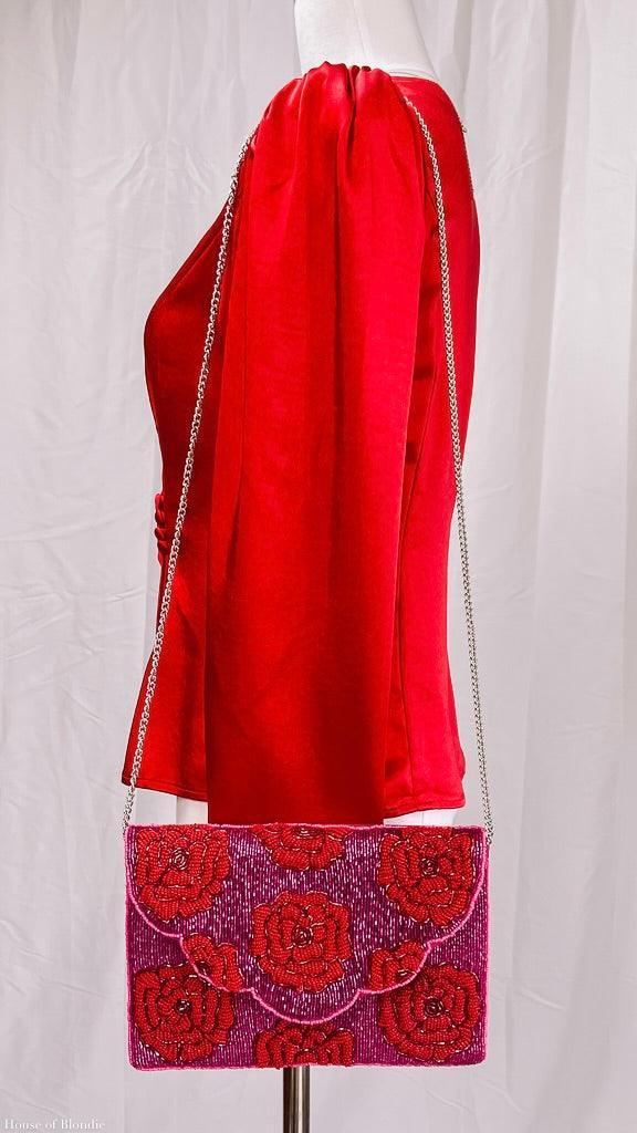 Red Roses On Pink Beaded Clutch by www.thehouseofblondie.com