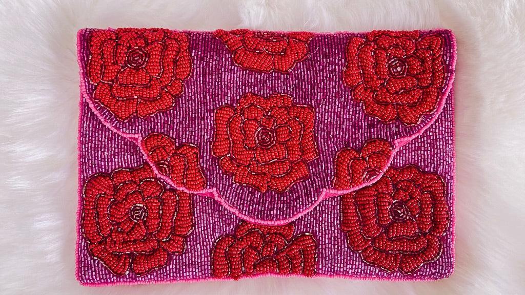 Red Roses On Pink Beaded Clutch by www.thehouseofblondie.com